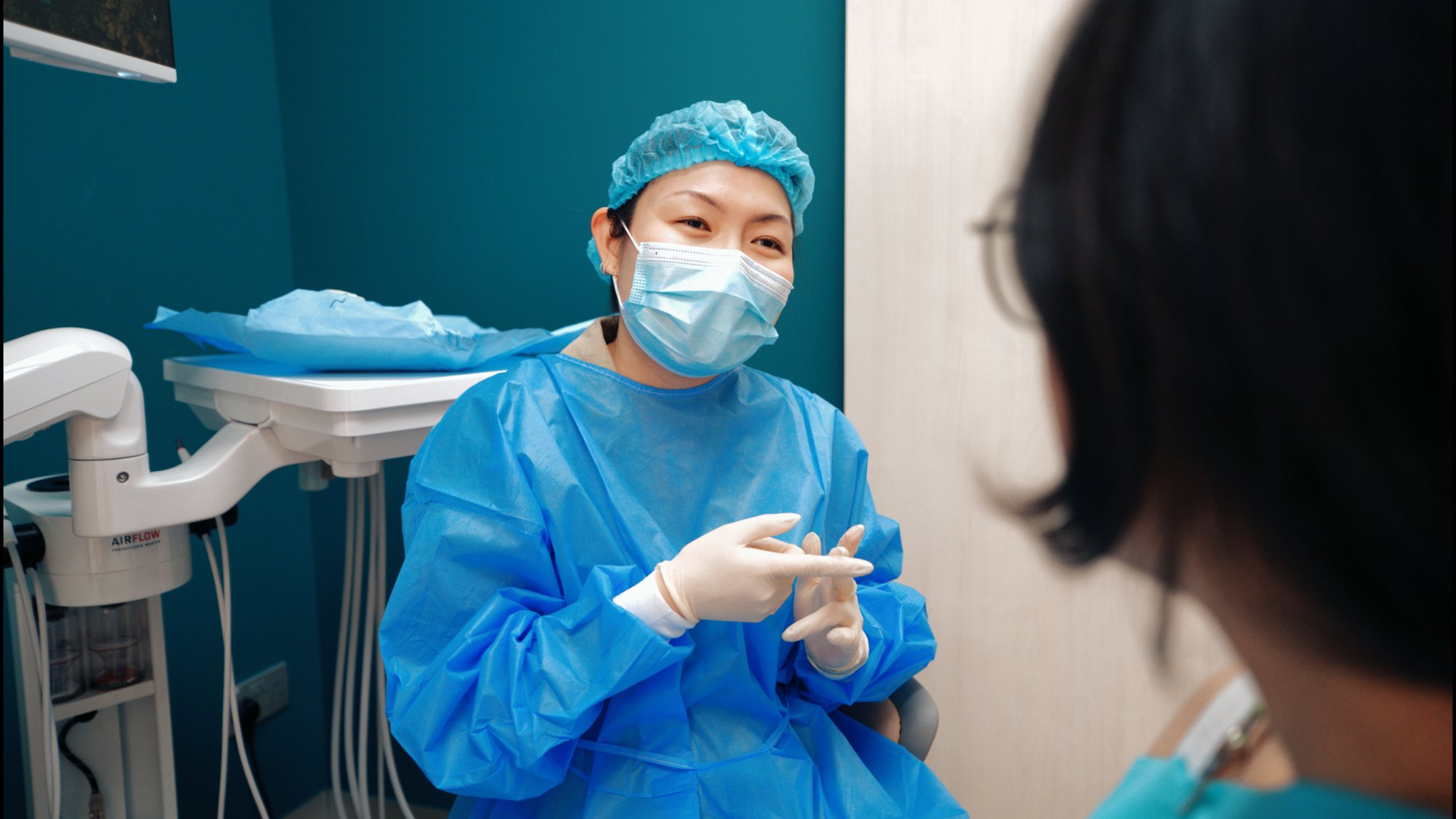 Dr Christine Ma (holistic dentist) giving a consultation to a holistic patient